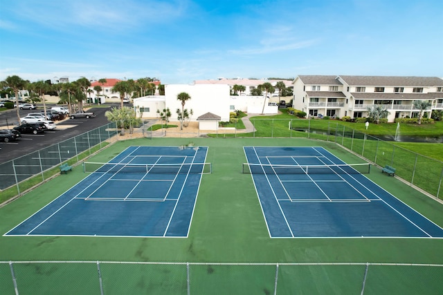 view of sport court featuring basketball hoop