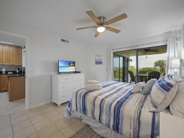 bedroom featuring ceiling fan, light tile patterned flooring, and access to outside