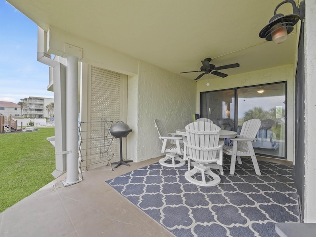 view of patio with ceiling fan