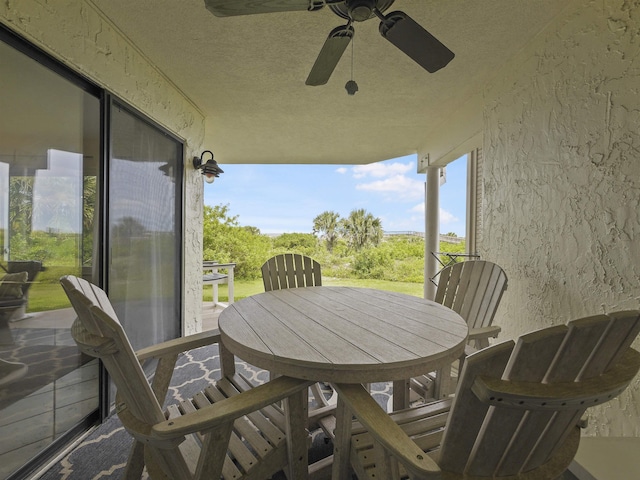 view of patio / terrace featuring ceiling fan