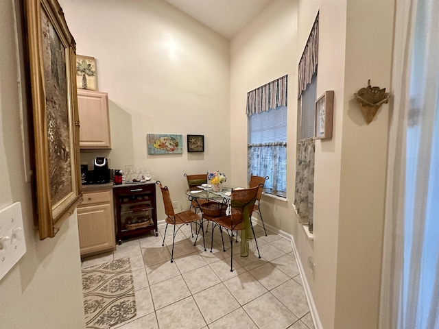 dining space with light tile patterned floors