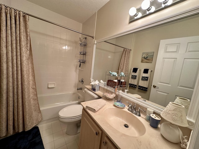 full bathroom with tile patterned floors, a textured ceiling, toilet, shower / bath combo with shower curtain, and vanity