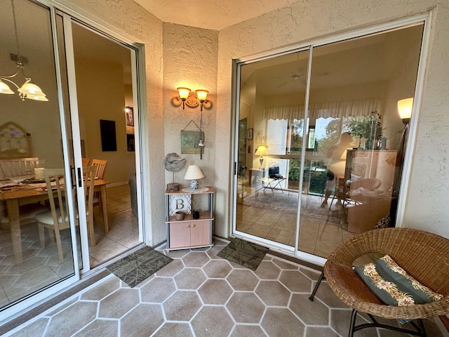 doorway to property with a patio