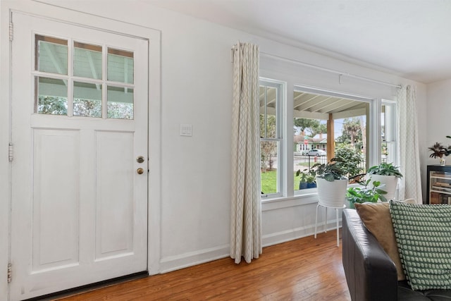 entryway with light hardwood / wood-style flooring