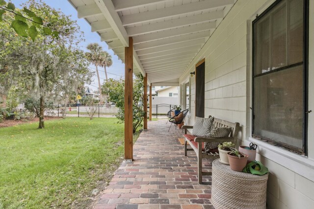 view of patio featuring a porch