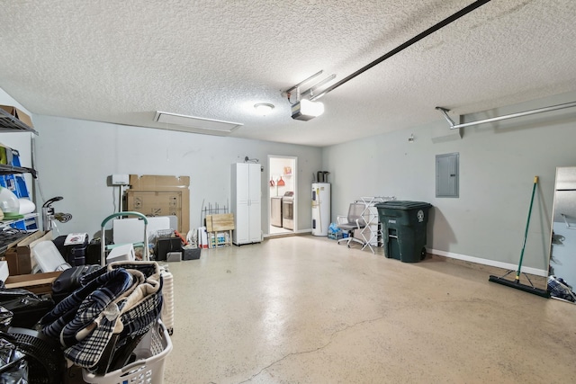 garage featuring electric water heater, baseboards, electric panel, a garage door opener, and washer / dryer