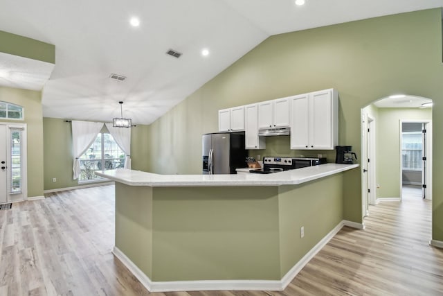 kitchen with pendant lighting, white cabinets, stainless steel appliances, kitchen peninsula, and light wood-type flooring