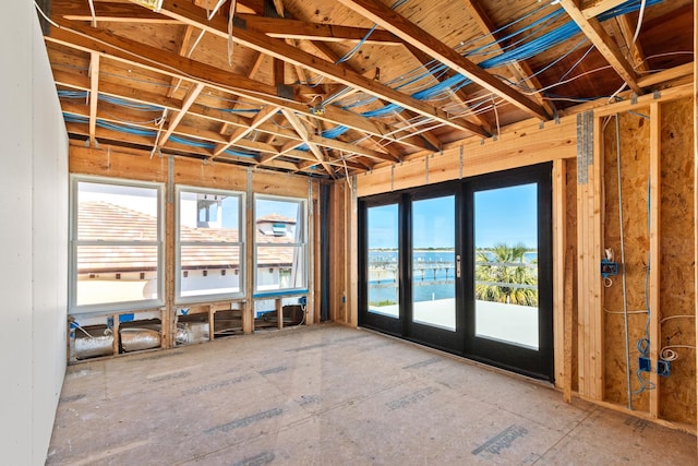 miscellaneous room featuring a water view and french doors