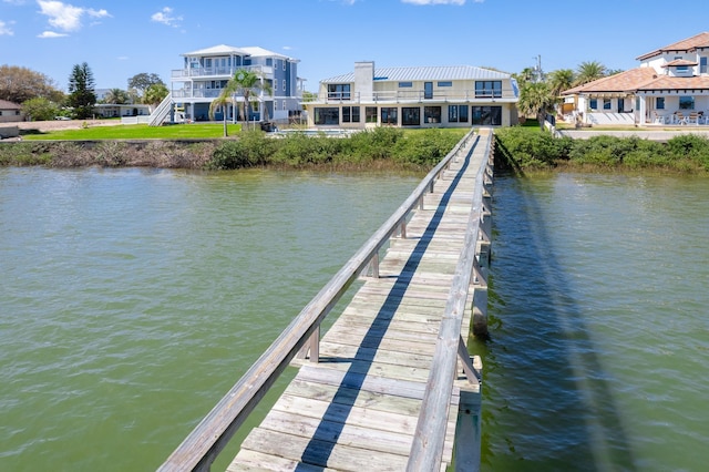 dock area with a water view