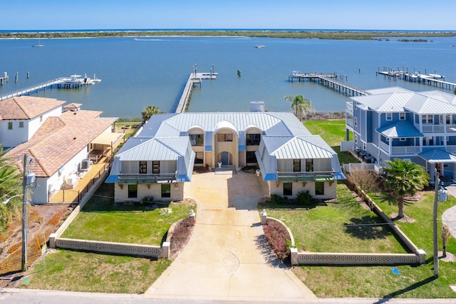 drone / aerial view with a water view