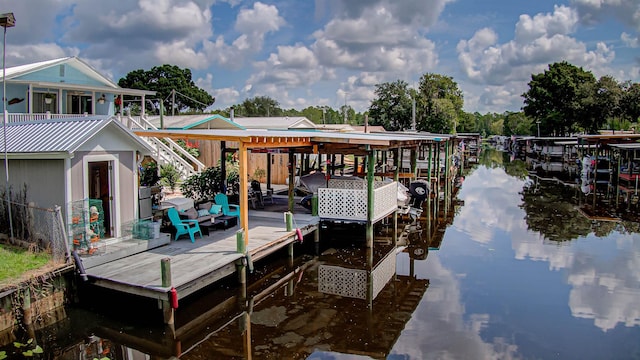 dock area with a water view