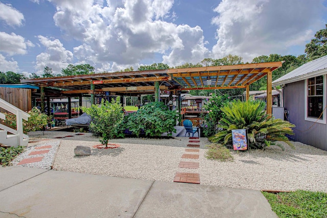 exterior space featuring a pergola