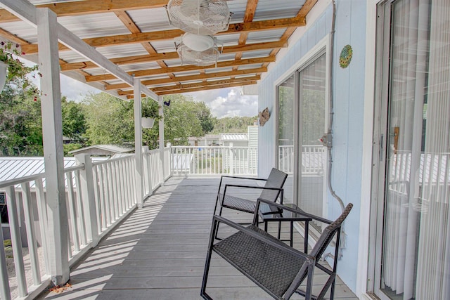 wooden terrace with ceiling fan