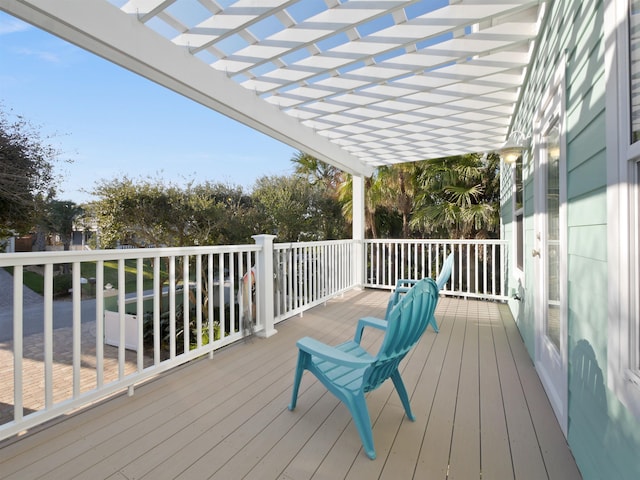 wooden terrace with a pergola