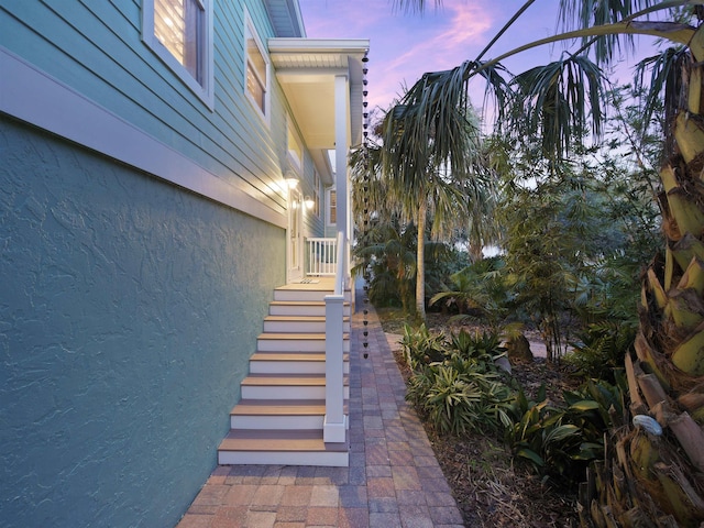 view of property exterior at dusk