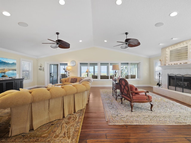 living room with dark hardwood / wood-style flooring, plenty of natural light, and crown molding