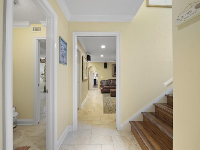 corridor featuring ornamental molding