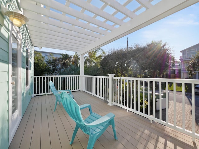 wooden terrace with a pergola