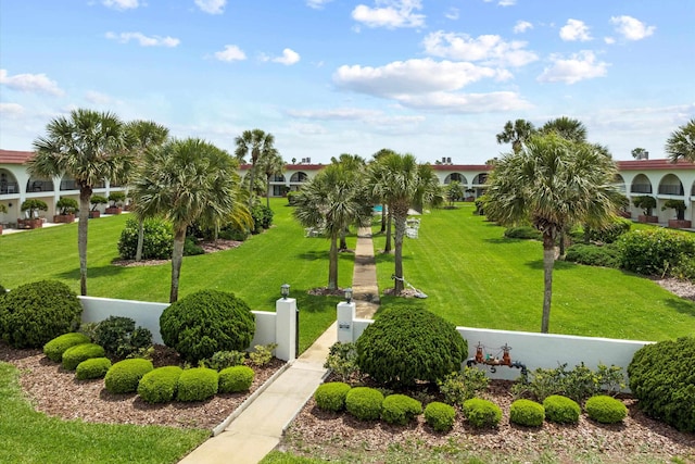 view of community featuring a lawn