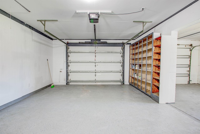 garage featuring a garage door opener