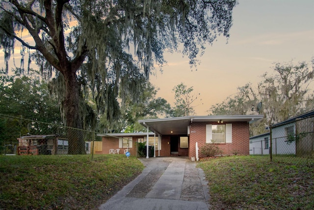 view of front of house featuring a carport