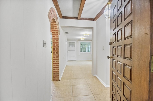 100 Spring St, Saint Augustine, FL 32084 - hall with light tile patterned floors and baseboards