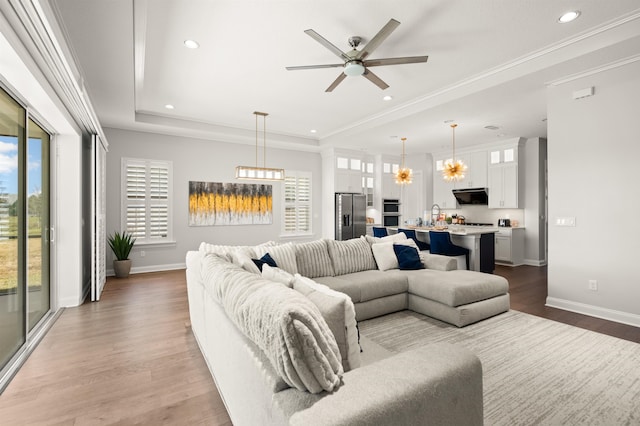 87 Amarante Ln, Saint Augustine, FL 32095 - living area featuring wood finished floors, healthy amount of natural light, ceiling fan, recessed lighting, and baseboards