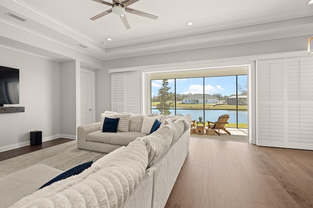 87 Amarante Ln, Saint Augustine, FL 32095 - living area featuring wood finished floors, crown molding, recessed lighting, ceiling fan, and a water view