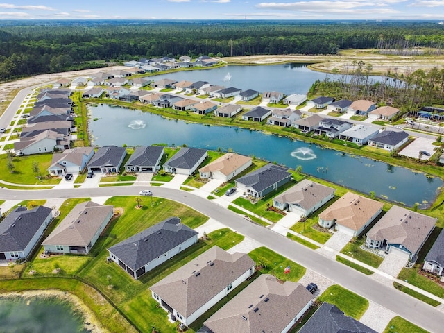82 Lone Cypress Way, Saint Augustine, FL 32092 - aerial view of residential area with a heavily wooded area and a nearby body of water