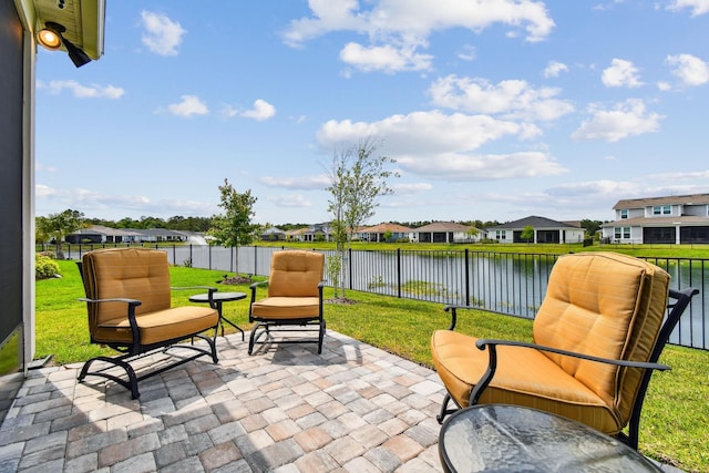 82 Lone Cypress Way, Saint Augustine, FL 32092 - fenced backyard featuring a residential view, a patio, and a water view