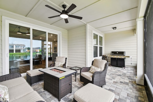 82 Lone Cypress Way, Saint Augustine, FL 32092 - view of patio with ceiling fan, a grill, and an outdoor living space with a fire pit