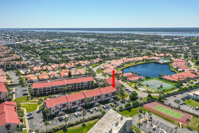 aerial view featuring a residential view and a water view