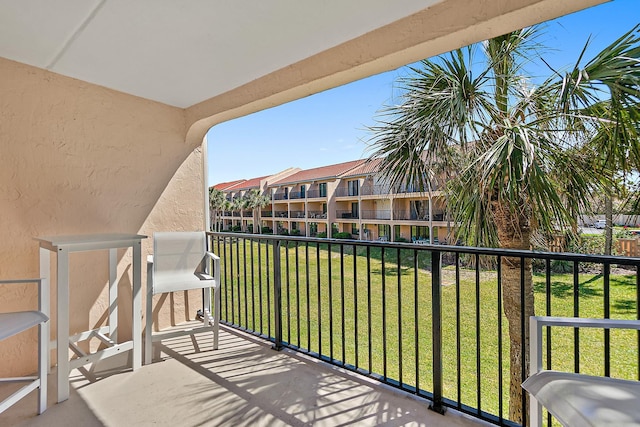 balcony featuring a residential view