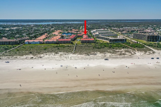 bird's eye view featuring a beach view and a water view