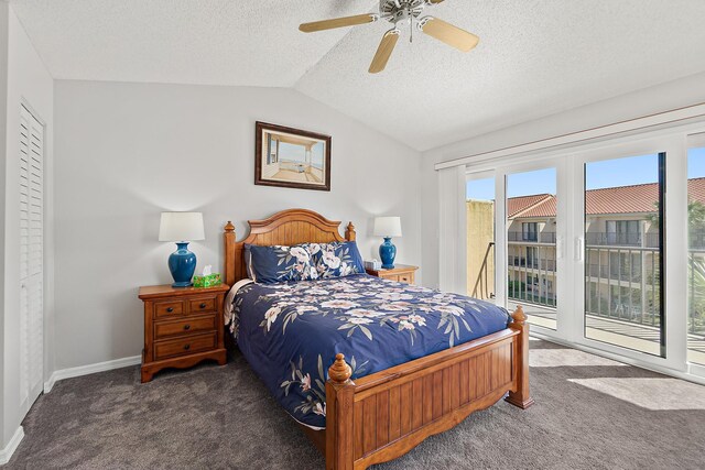 carpeted bedroom featuring vaulted ceiling, a textured ceiling, baseboards, and access to outside