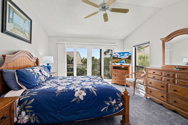 bedroom with multiple windows, carpet, vaulted ceiling, and access to outside