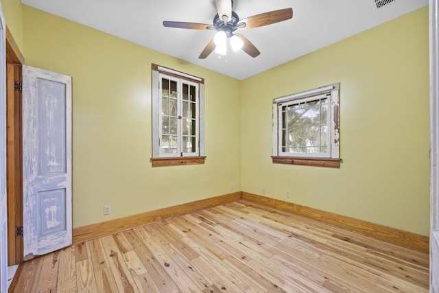 unfurnished room with ceiling fan and light hardwood / wood-style flooring