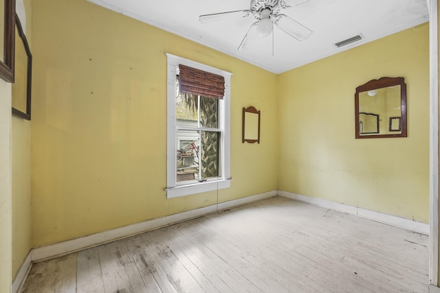 unfurnished room featuring light hardwood / wood-style floors and ceiling fan