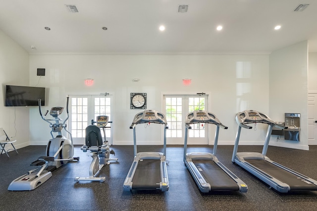 exercise room with visible vents, french doors, and crown molding