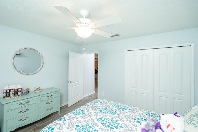 bedroom featuring a closet and ceiling fan