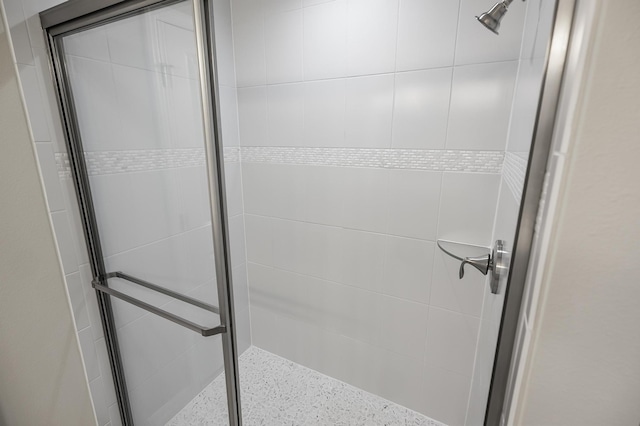 bathroom featuring an enclosed shower