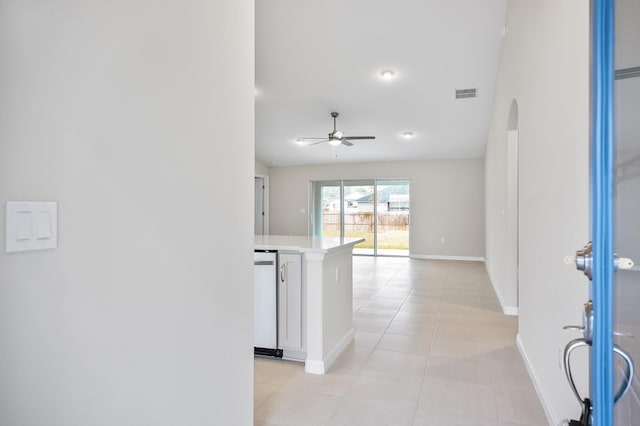 hallway featuring light tile patterned floors