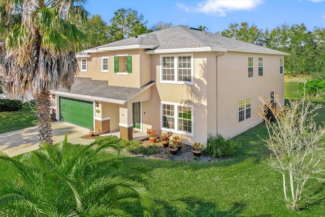 4905 Cypress Links Blvd, Elkton, FL 32033 - view of front facade with a shingled roof, stucco siding, driveway, and an attached garage