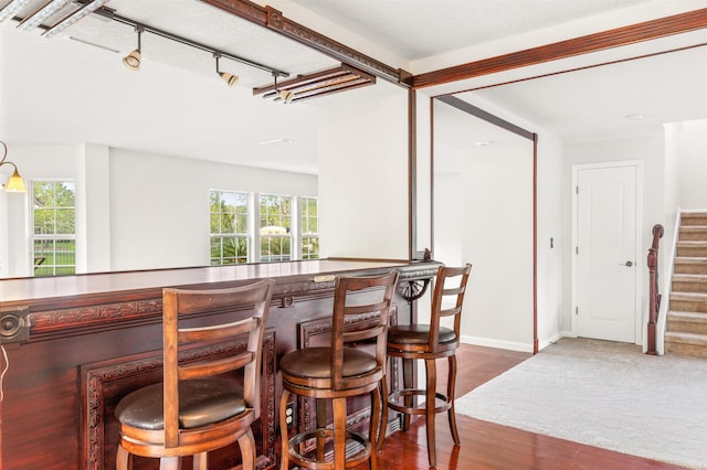 4905 Cypress Links Blvd, Elkton, FL 32033 - indoor dry bar featuring stairway and wood finished floors