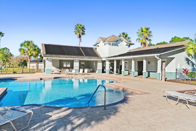 view of pool featuring a patio