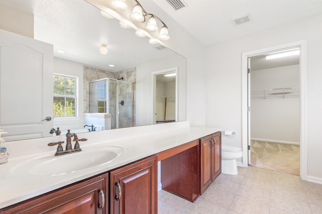 4905 Cypress Links Blvd, Elkton, FL 32033 - bathroom with a spacious closet, a shower stall, vanity, and tile patterned flooring