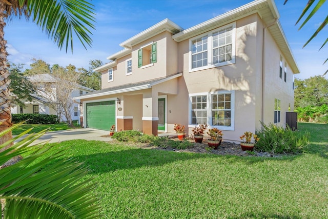 view of front of property with a garage and a front lawn