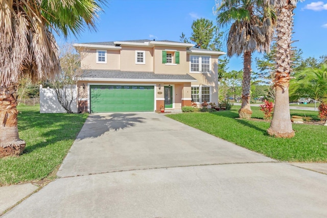 view of front facade with a garage and a front lawn