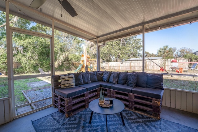 sunroom with ceiling fan and a wealth of natural light