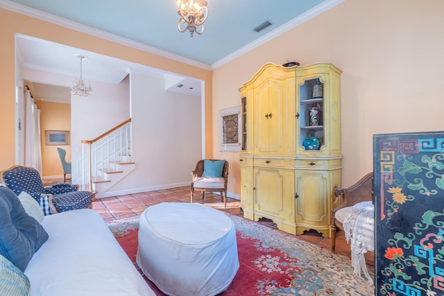 living room with a notable chandelier, light tile patterned floors, and crown molding